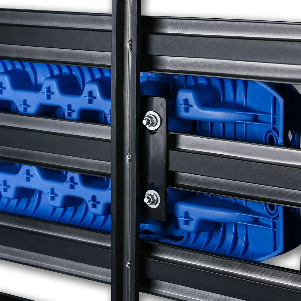 Recovery boards locked to roof rack bars with mounting pin