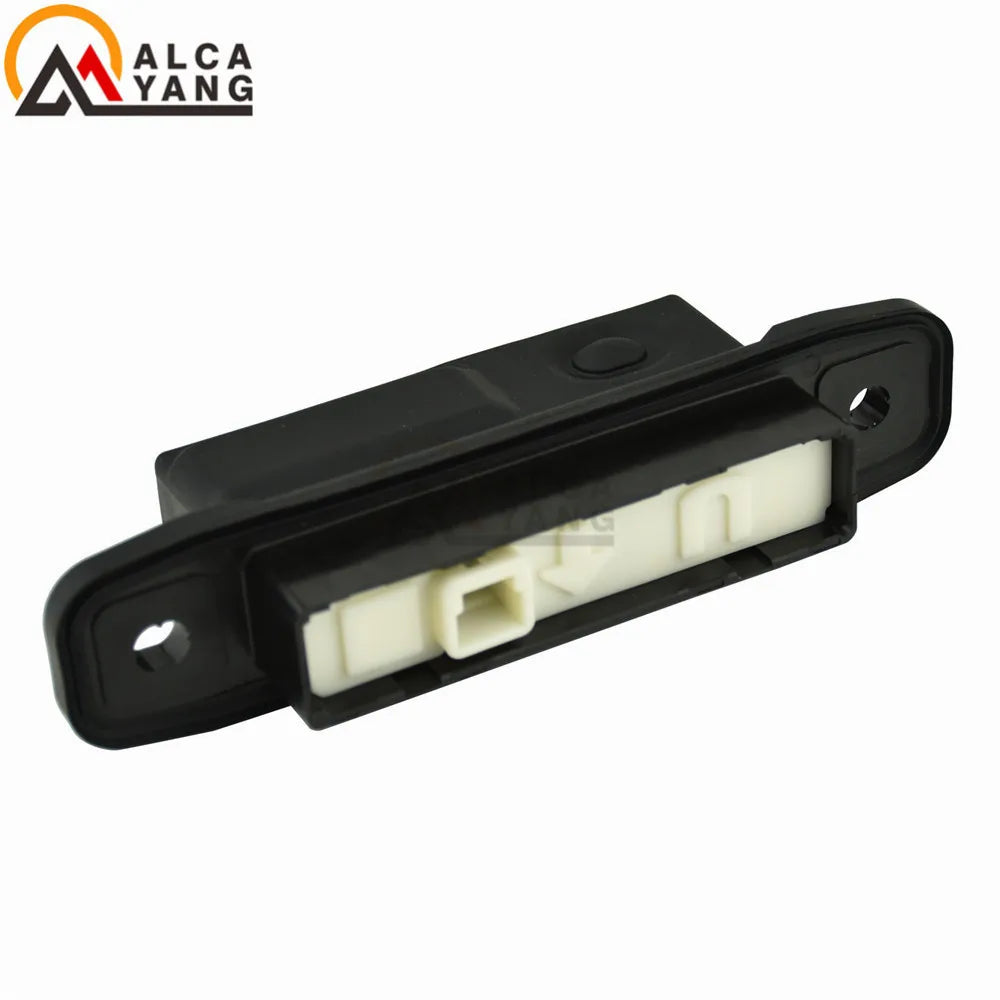 Release switch fitted above number plate, LandCruiser 200 Series