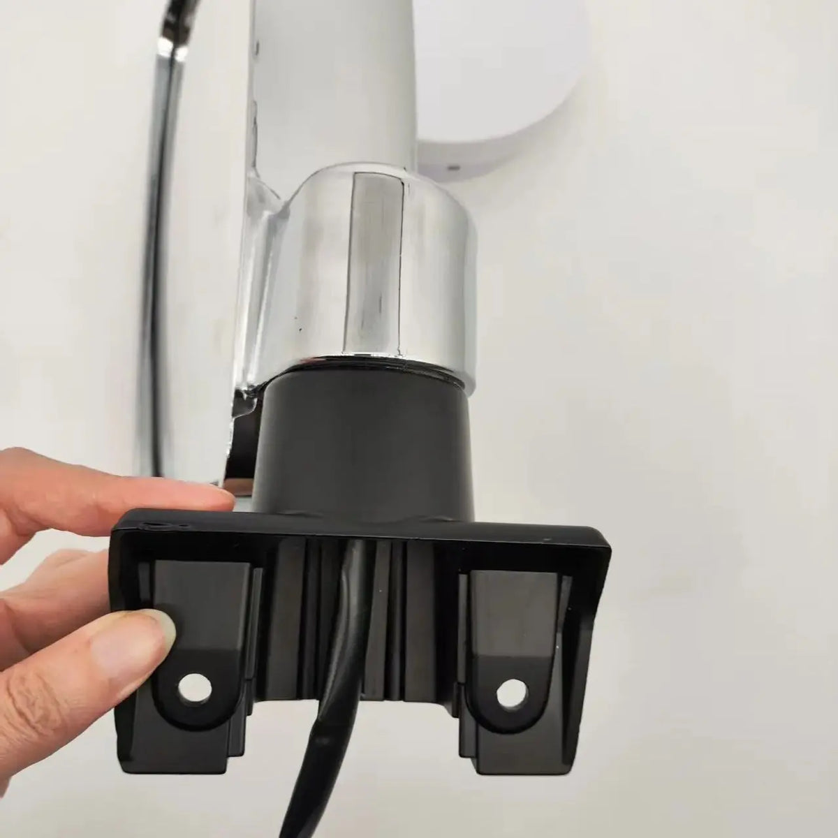 Door mirror black mounting base close up