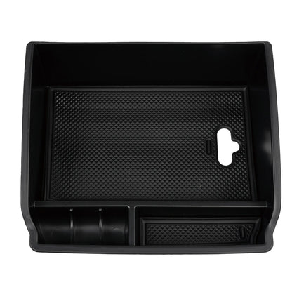 Console tray showing divided storage compartments