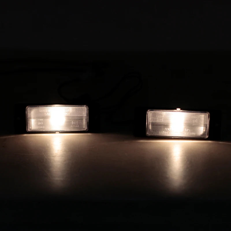 Pajero plate light back