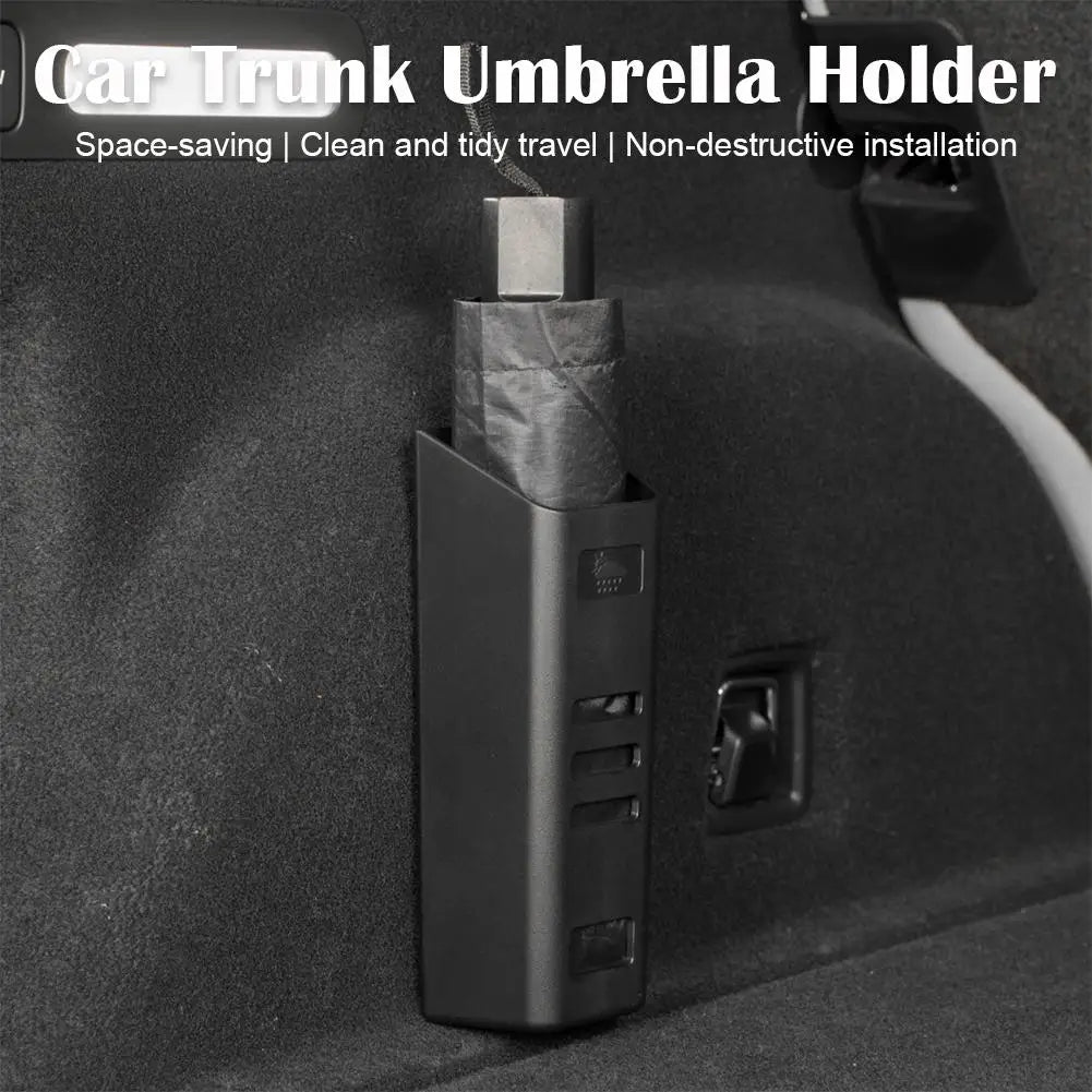 Umbrella holder fitted to the side of a car boot