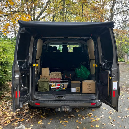 Van rear doors open with waterproof awning over the load space