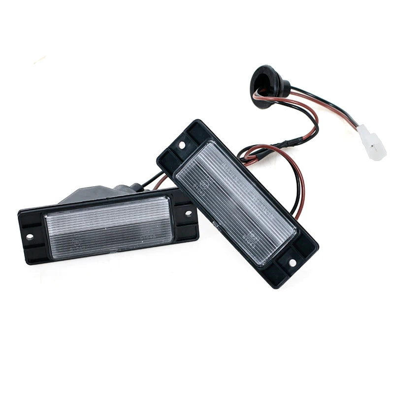 Pajero plate light assembly