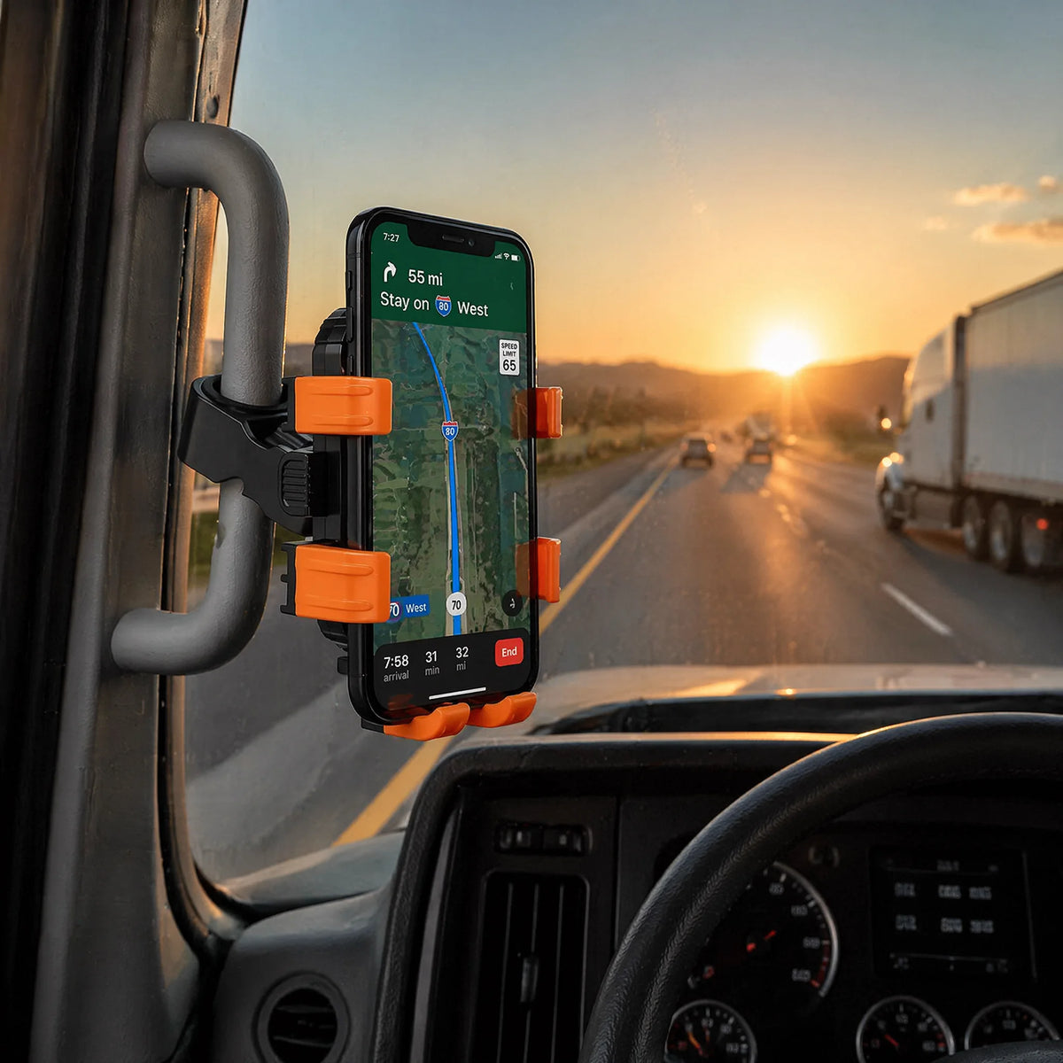 Grab handle phone mount holding a phone in a truck cab