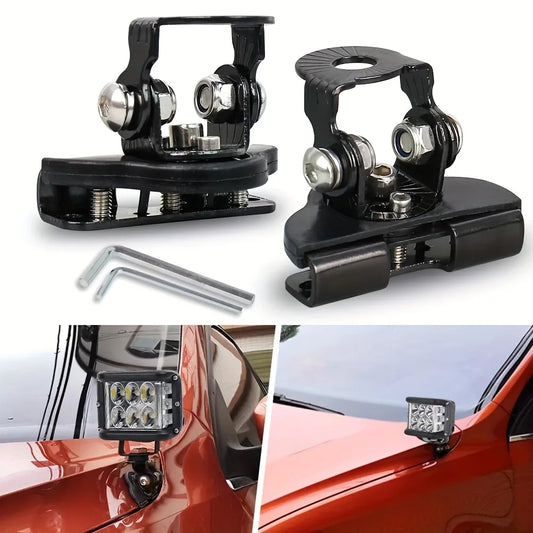 Black bonnet light bracket clamps with hex keys and LED pods fitted