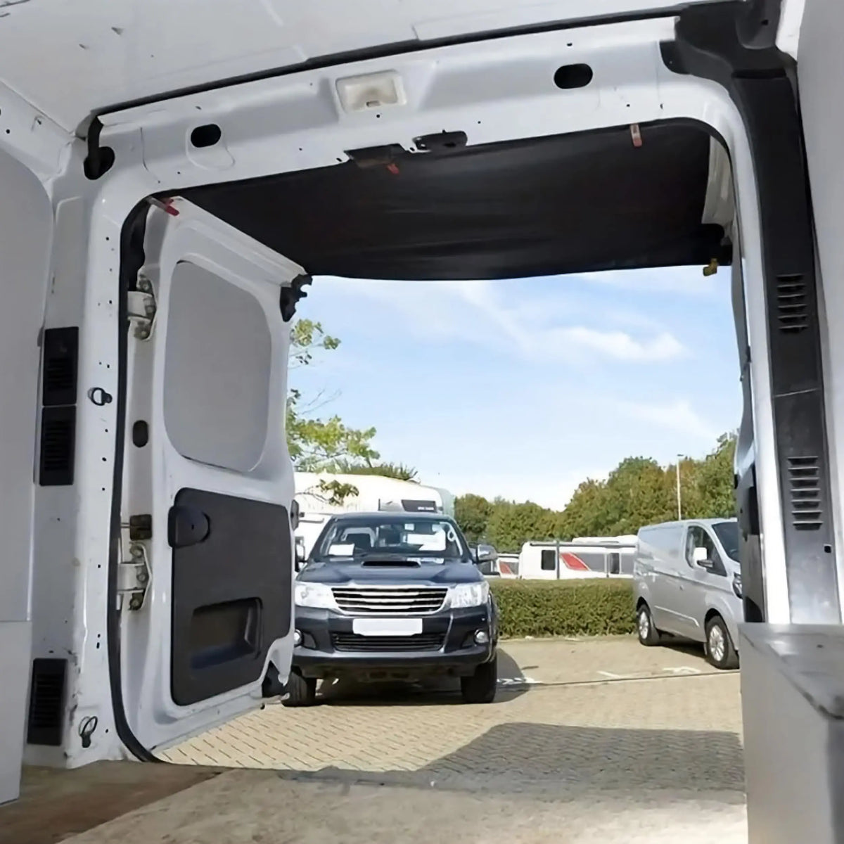 View from inside the van under the barn door awning