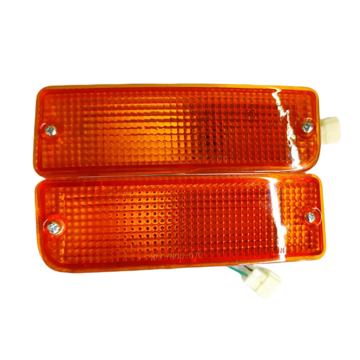 Left and right amber front corner indicator lights for early Hilux