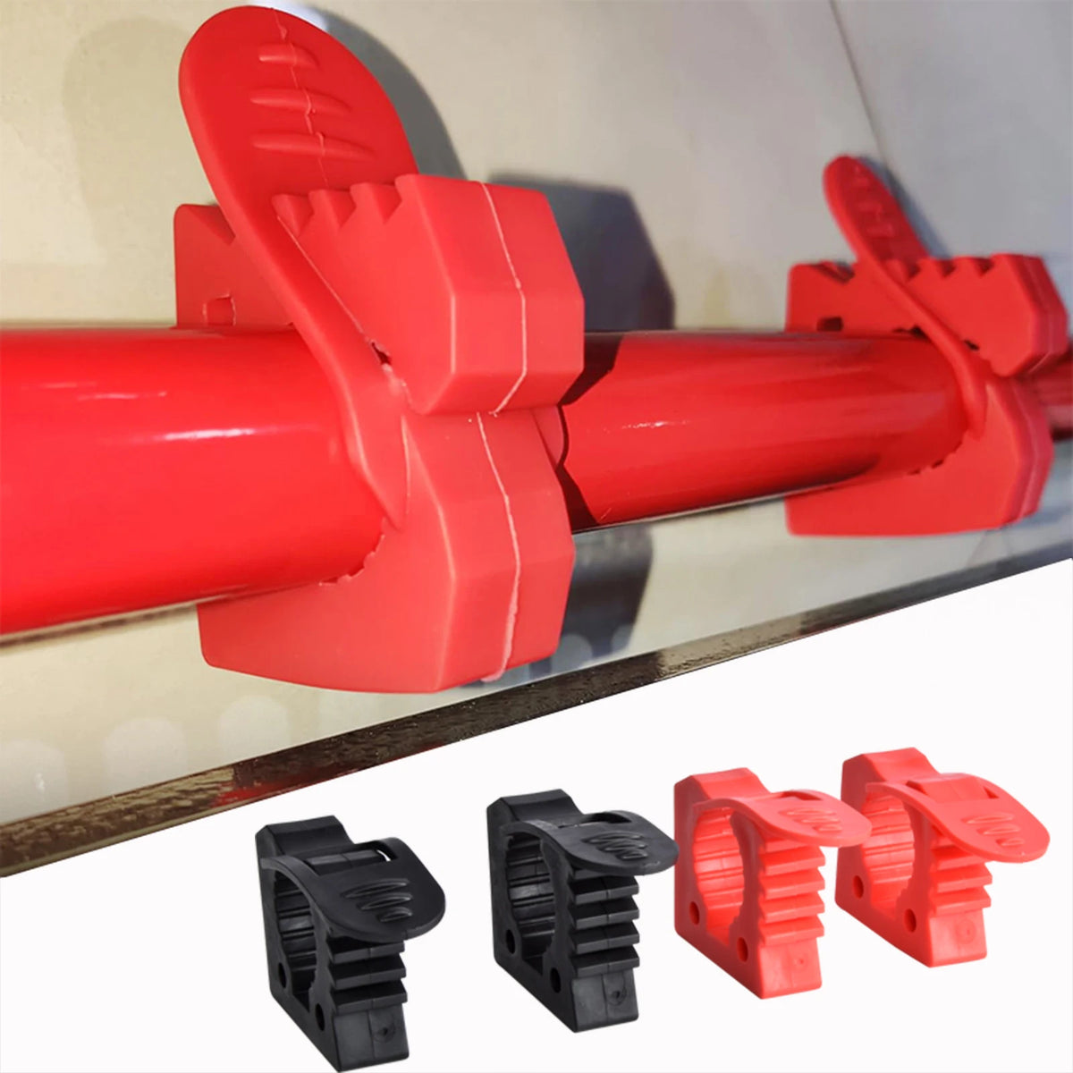 Red and black quick release tool clamps on a tube