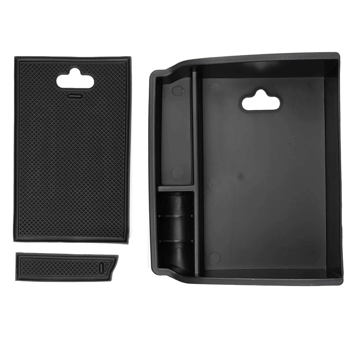 Armrest storage tray lifted out of the console bin