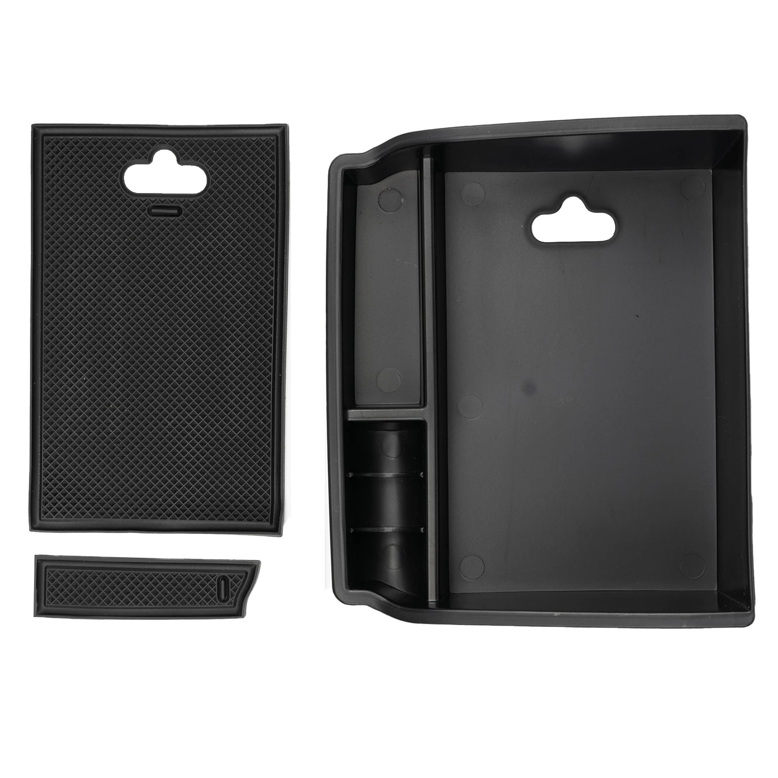 Armrest storage tray lifted out of the console bin
