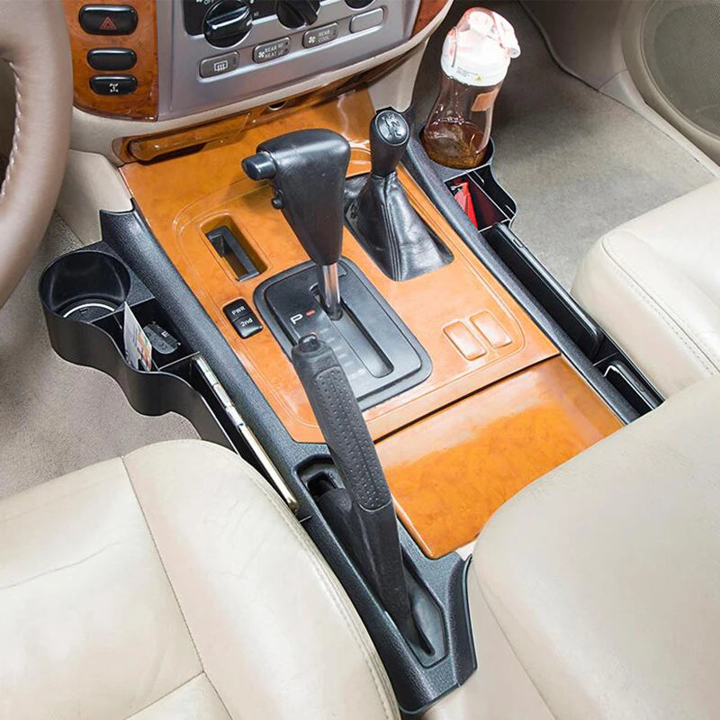 Storage box fitted between seat and centre console