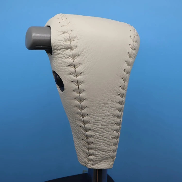 Gear shift sleeve showing stitching styles