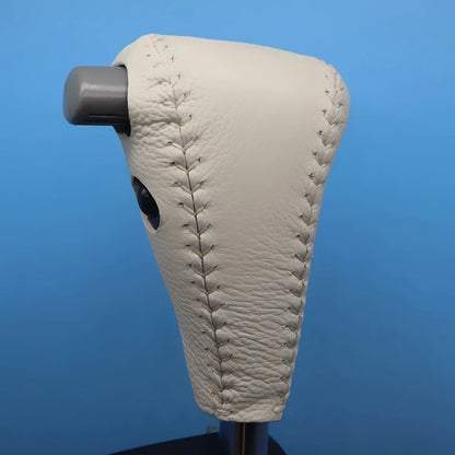 Gear shift sleeve showing stitching styles