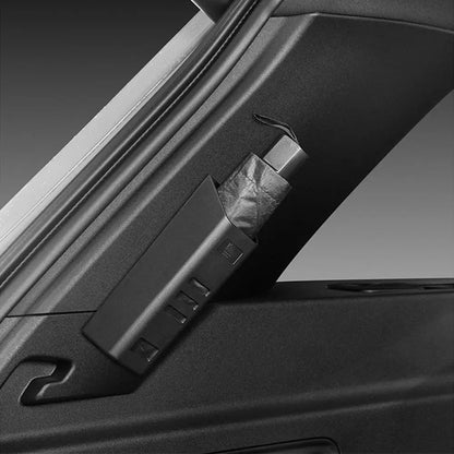 Umbrella holder fitted near the tailgate opening