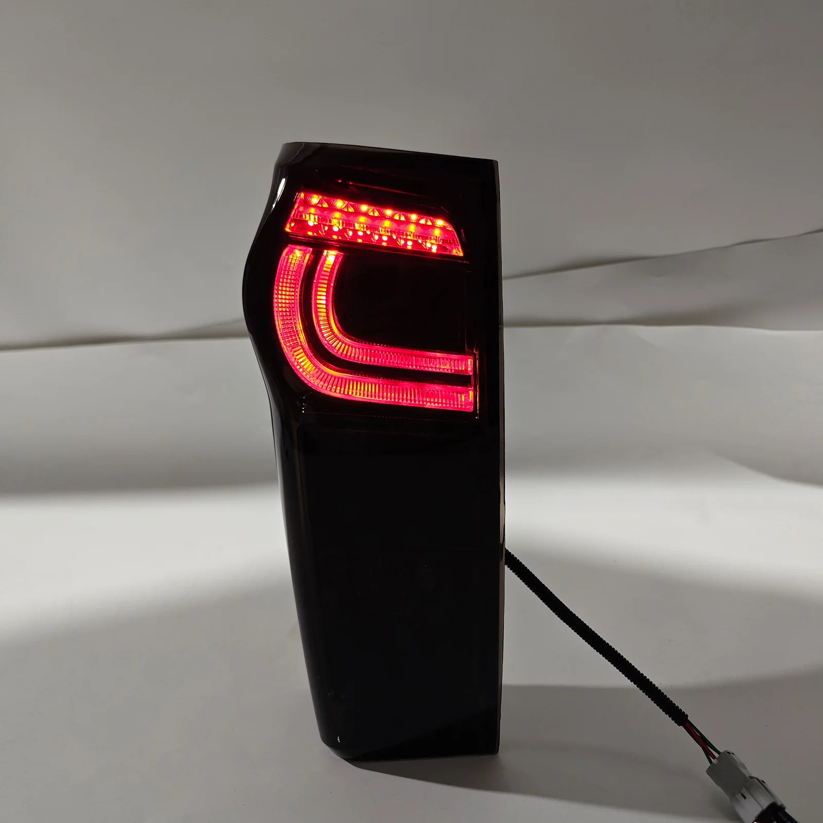 LED tail light illuminated at night on Isuzu D-MAX