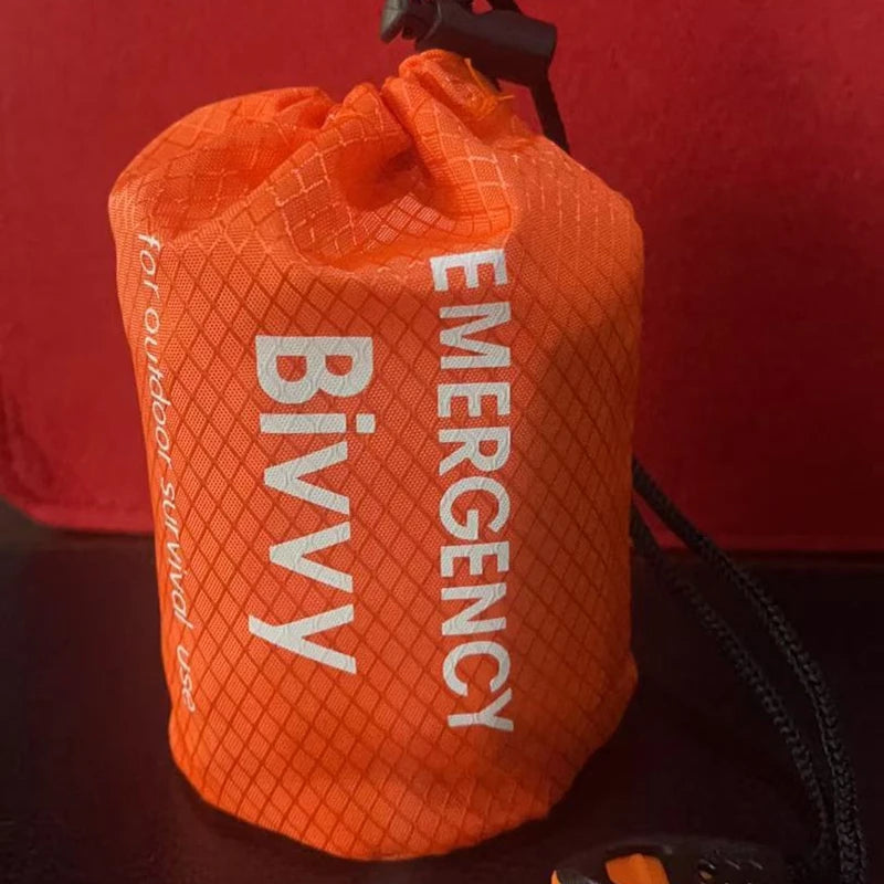 Emergency bivvy thermal survival sleeping bag - orange with stuff sack and whistle