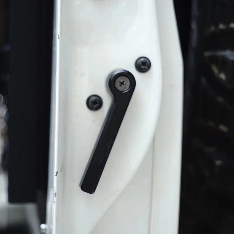 Black rear barn door handle fitted on white LandCruiser
