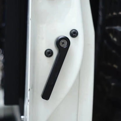 Black rear barn door handle fitted on white LandCruiser