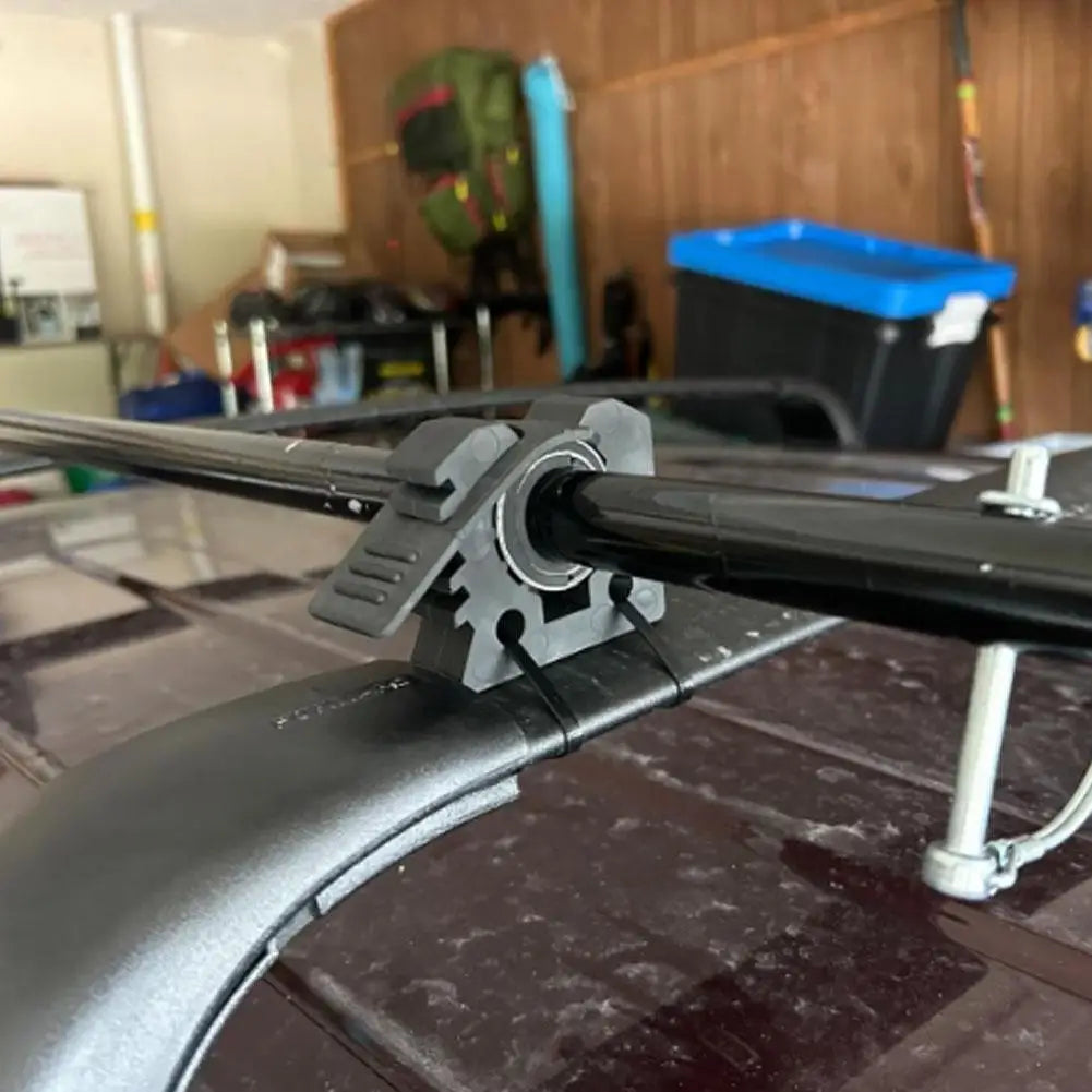 Rubber quick-release clamp on a roof rack bar