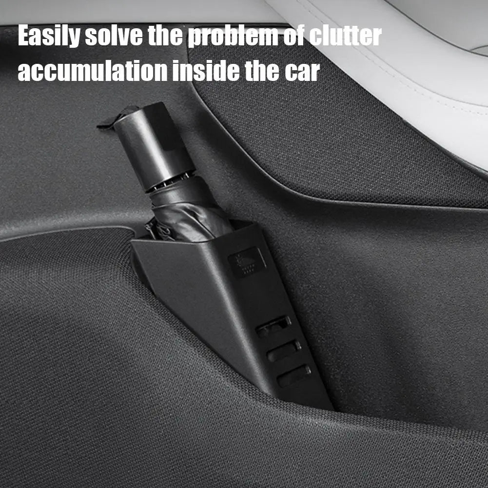 Folding umbrella stored upright in the boot holder