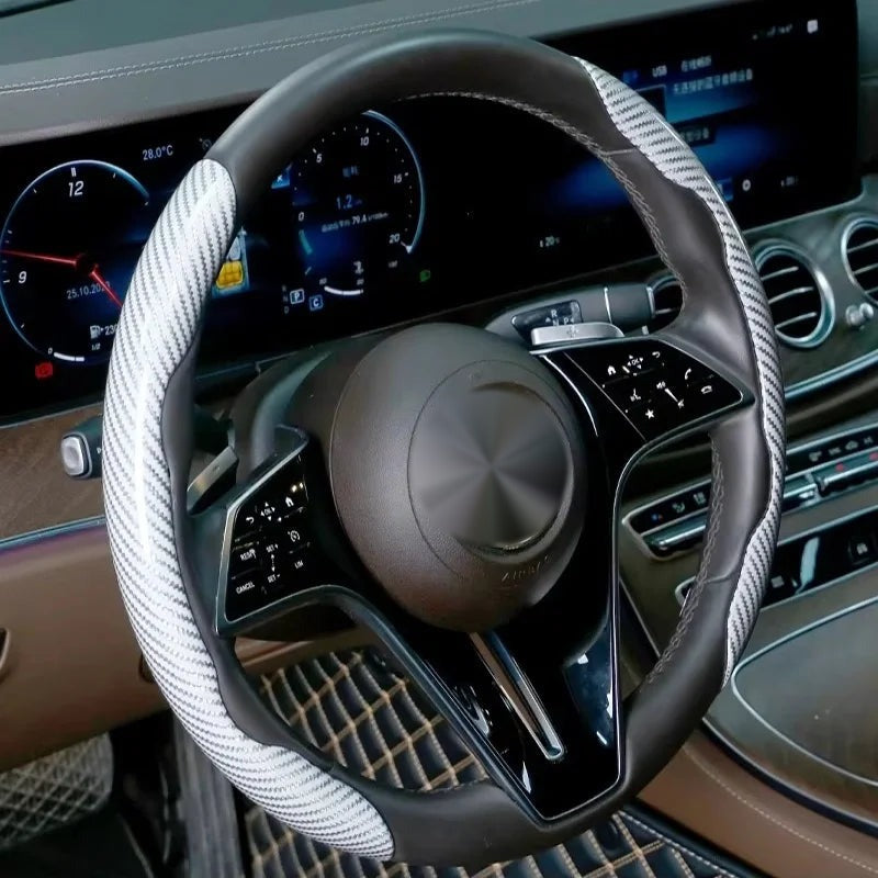 White carbon-look steering wheel grip covers fitted