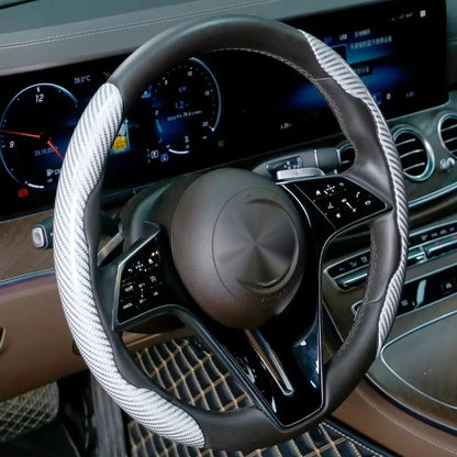 White carbon-look steering wheel grip covers fitted