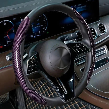 Purple carbon-look steering wheel grip covers fitted