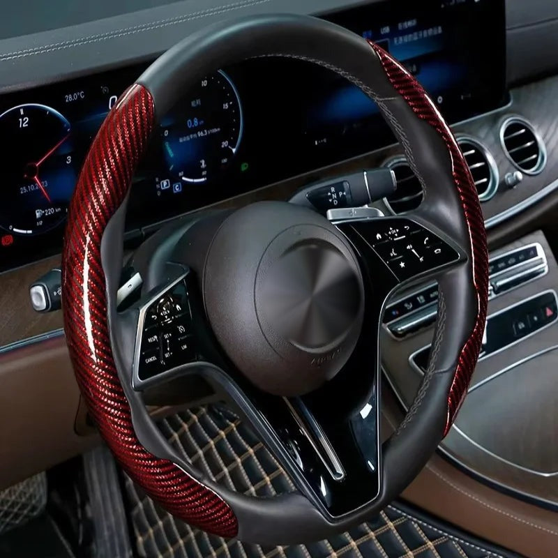 Red carbon-look steering wheel grip covers fitted