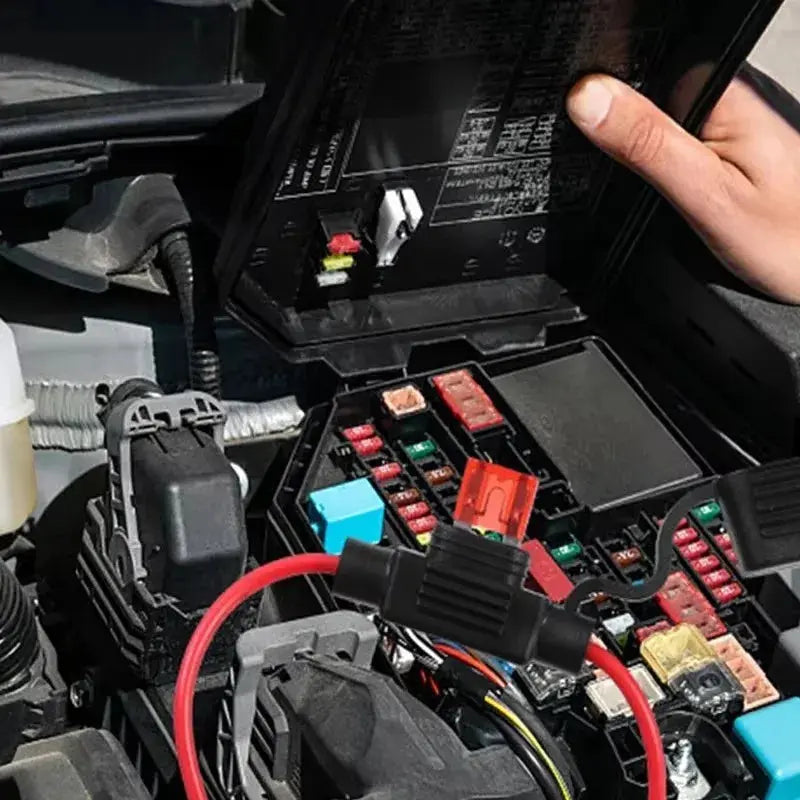 Fuse holder opened showing the mini blade fuse